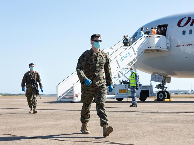 Observing Federal and Northern Territory health requirements, US Marines of Marine Rotational Force - Darwin arrive at RAAF Base Darwin, NT. *** Local Caption *** The first 200 US Marines from the 2020 Marine Rotational Force â Darwin arrived at RAAF Darwin today. Each Marine was screened four days prior to departure to Australia. They were then screened and tested for COVID-19 upon arrival in Australia, before being quarantined for 14 days at specially prepared Defence facilities in the Darwin area. Each Marine will be re-tested at the conclusion of the quarantine period. The modified rotation will involve around 1,200 Marines who will exercise exclusively at Defence training areas in the Northern Territory until September. As announced on 6 May, a modified deployment of Marine Rotational Force â Darwin would proceed this year, following careful planning and preparations undertaken by both Australia and the United States to minimise COVID-19 risks to the Northern Territory.