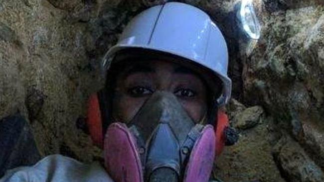 Askia Khafra, pictured working in the tunnel, was blindfolded daily on his way to the tunnels so he would not know their exact location, prosecutors say. Picture: Montgomery County Court