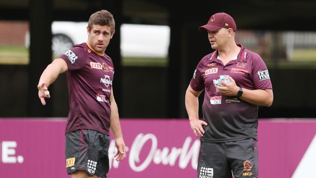 Andrew McCullough talks with Anthony Seibold during a Broncos training session. Picture: Peter Wallis