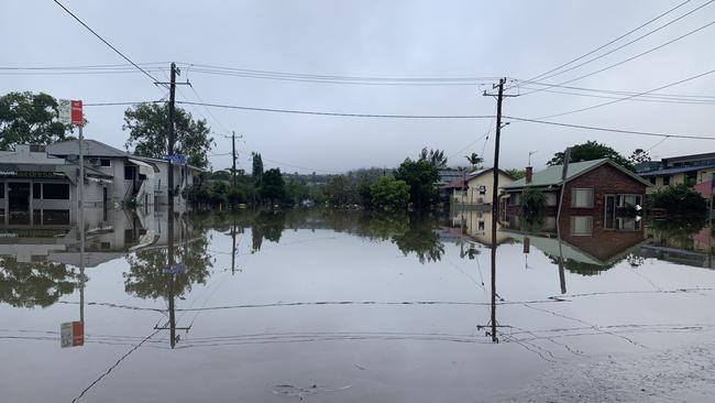 Homes on Hunter Street in Lismore were still inundated with flood water on March 1, 2022.