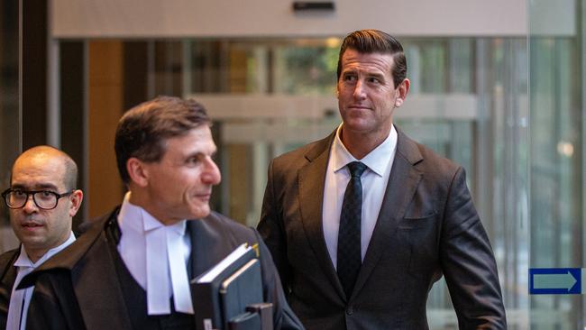 Mr Roberts-Smith and his legal team including barrister Arthur Moses SC at the Federal Court in Sydney. Picture: NCA NewsWire / Christian Gilles