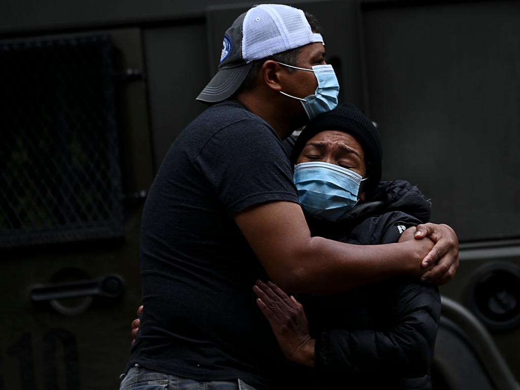 Relatives of people killed in flooding in Panama City. Picture: Luis ACOSTA / AFP