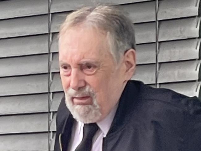 Michael John Astill leaving Gosford Local Court after pleading guilty to three counts of using a carriage service to access child abuse material. Picture: NewsLocal