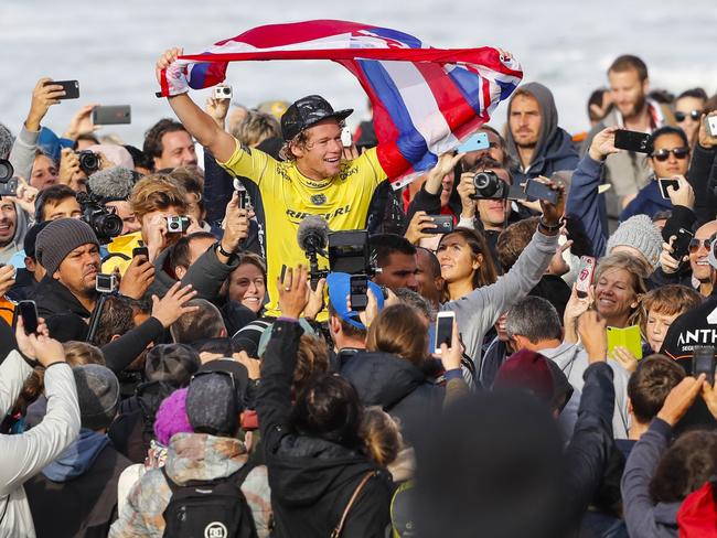 John John Florence celebrating his world title victory.