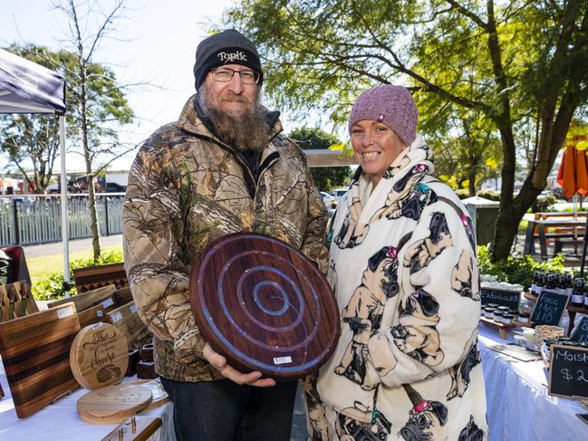 Chinchilla's Paul Varidel and DJ Young at Paul's Wax'n Oil stall at the NAIDOC arts and craft market at Grand Central, Saturday, July 9, 2022. Picture: Kevin Farmer