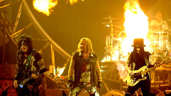 Nikki Sixx, Vince Neil, Mick Mars, and Tommy Lee of Motley Crue perform. Picture: Tim Mosenfelder/Getty Images