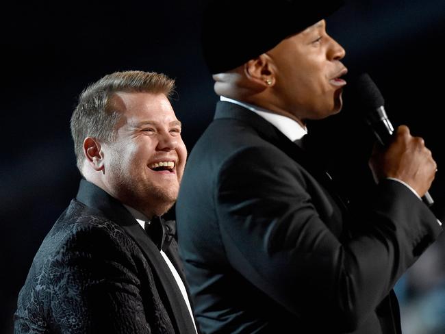 James Corden presents at the 2016 Grammy Awards with LL Cool J.