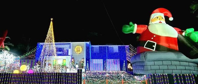 This Wynnum home has got one of the biggest Santa inflatables in Brisbane. Picture: Facebook