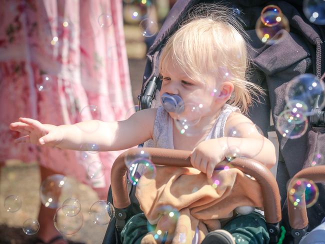 Kayden Cameron, 16 months, enjoying day one of the Royal Darwin Show. Picture: Glenn Campbell