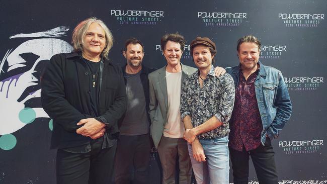 Brisbane rock band Powderfinger, pictured at an exclusive fan event and film screening held at Palace Barracks cinema celebrating the 20th anniversary of its 2003 album 'Vulture Street'. L-R: Ian Haug, Jon Coghill, Bernard Fanning, Darren Middleton, and John Collins. Picture: Marianna Heberley