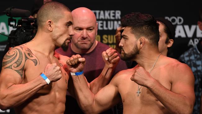 Robert Whittaker (left) and Kelvin Gastelum face off in Melbourne in February. Picture: Getty Images