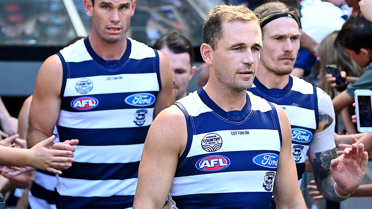 Joel Selwood leads Geelong onto the MCG for round 1 of the 2022 season.