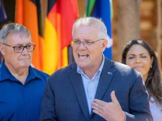 Prime Minister Scott Morrison in Alice Springs alongside Lingiari candidate Damien Ryan and Senate candidate Jacinta Price where he announced $14 million to address increasing rates of crime.  Picture: NCA / Jason Edwards