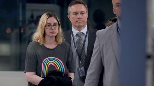 Lisa Lines escorted by police in November 2023 after being extradited back to Australia. Picture: NCA NewsWire/Kelly Barnes