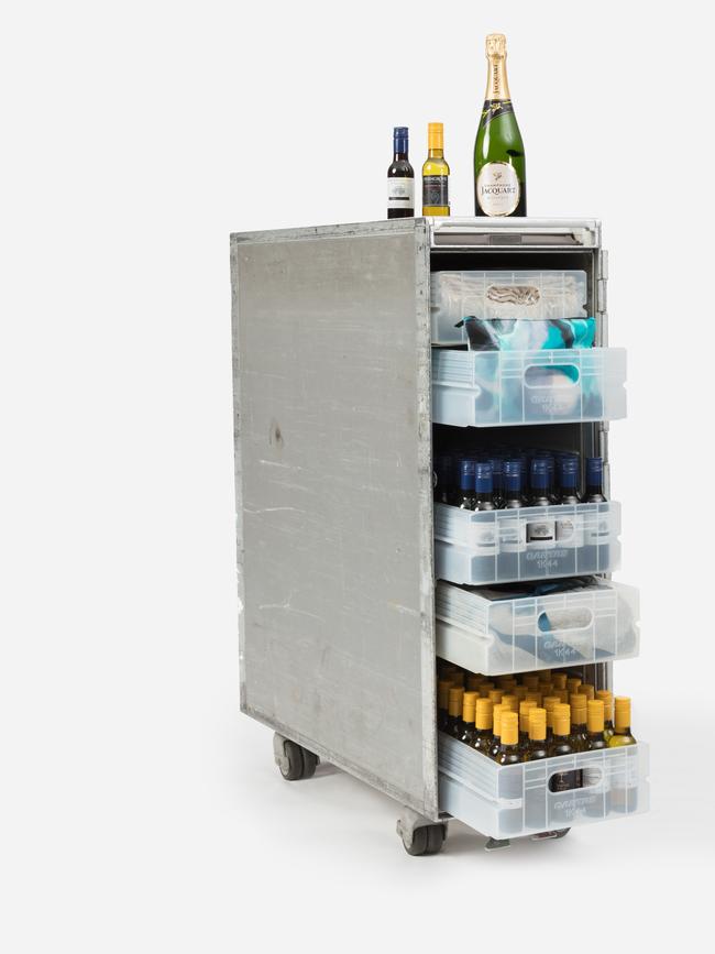 Qantas is selling off the furniture, or in this case 747 half bar carts, fully stocked with wine and other goodies. Picture: Supplied.