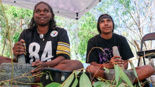 Edwina Murphy and Laneise Hall celebrating 10 years of the Learning on Country program. Picture: Glenn Campbell/NLC