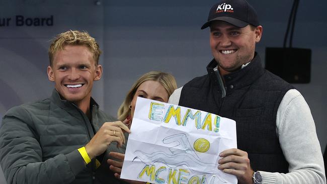 Emma McKeon’s cheer squad led by boyfriend Cody Simpson and David McKeon. Picture: Michael Klein