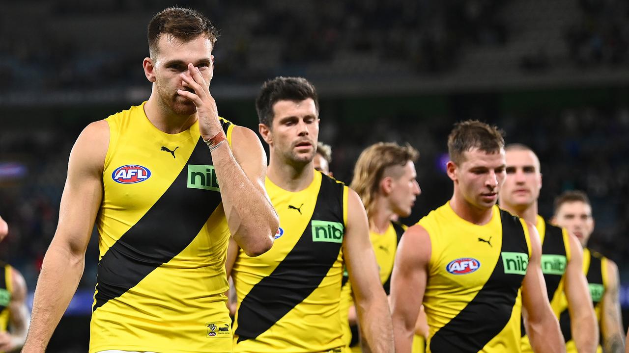 MELBOURNE, AUSTRALIA - APRIL 03: Noah Balta and his Tigers team mates look dejected after losing the round three AFL match between the St Kilda Saints and the Richmond Tigers at Marvel Stadium on April 03, 2022 in Melbourne, Australia. (Photo by Quinn Rooney/Getty Images)