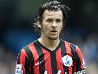 FILE - In this Sunday, May 10, 2015 file photo, Queens Park Rangers' Joey Barton watches the ball during their English Premier League soccer match at the Etihad Stadium, Manchester, England. After a short and ill-fated stint in Scottish football, Joey Barton is back in the English Premier League with former club Burnley. Burnley said Tuesday, Dec. 20, 2016 that the 34-year-old Barton has agreed to a deal until the end of the season, subject to international clearance when the transfer window opens in January. (AP Photo/Jon Super, file)