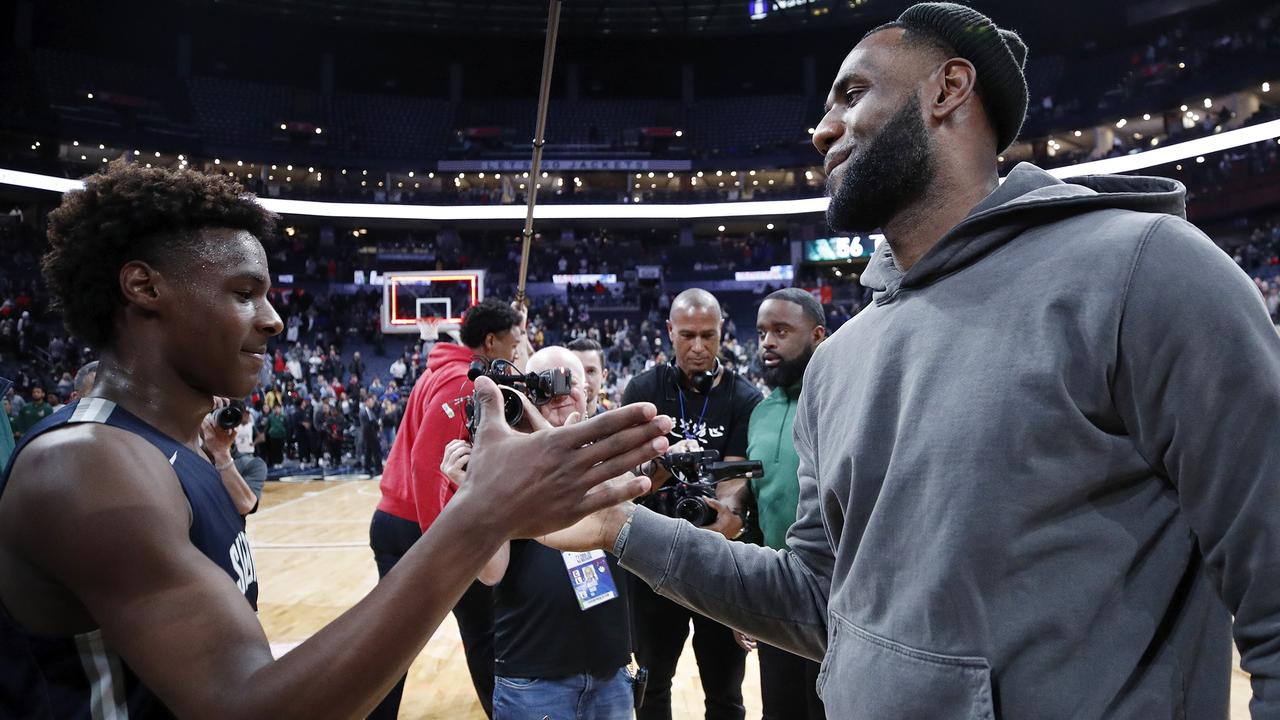 COLUMBUS, OH - DECEMBER 14: LeBron 'Bronny' James Jr. #0 of Sierra Canyon High School is greeted by his father LeBron James of the Los Angeles Lakers following the Ohio Scholastic Play-By-Play Classic against St. Vincent-St. Mary High School at Nationwide Arena on December 14, 2019 in Columbus, Ohio. Joe Robbins/Getty Images/AFP == FOR NEWSPAPERS, INTERNET, TELCOS &amp; TELEVISION USE ONLY ==
