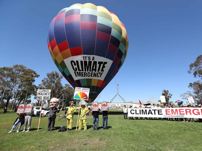 Climate Emergency Rally on the lawns outside at Parliament House in Canberra. Picture Kym Smith