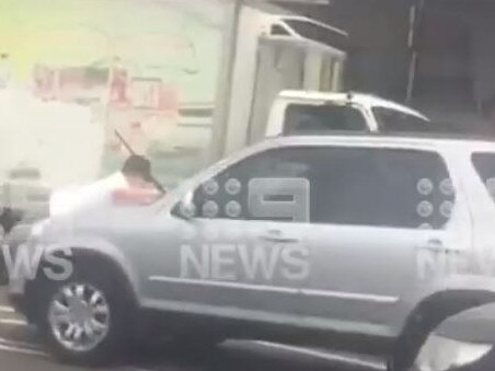 Stills from a Channel 9 video of the alleged incident at Homebush West on Friday. Picture: Channel 9