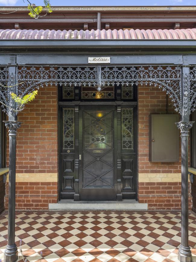 The combination of the bullnose veranda with wrought iron columns and frieze, tiled floor and bi-chrome brick has caught the eye of heritage assessors.