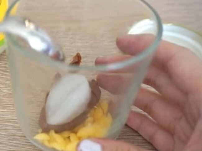 Mix the three ingredients together in a heatproof bowl, making sure to use one heaped tablespoon of Nutella. Picture: Youtube/Cute Life Hacks.