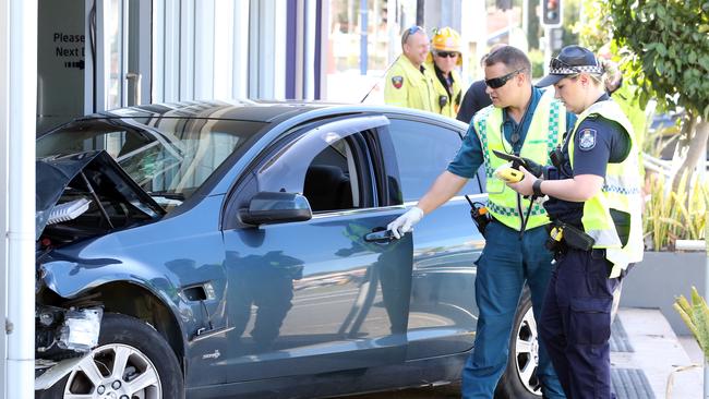 Police and paramedics at the scene. Picture: Richard Gosling