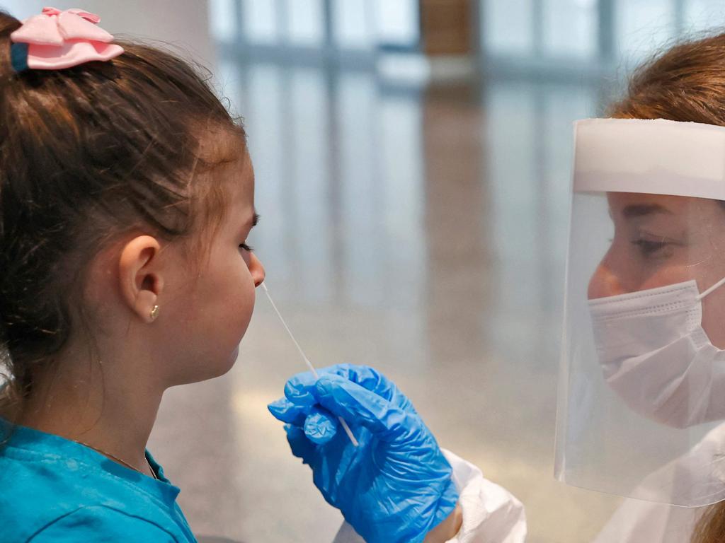 An Israeli child undergoes an antigen test. Picture: Jack Guez/AFP