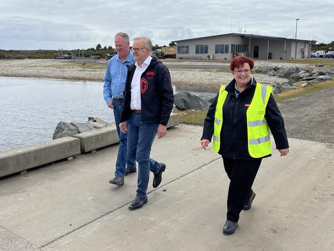 Prime Minsiter Anthony Albanese with Labor's Anne Urquart and West Coast mayor Shane Pitt touring salmon farming facilities on Tasmania's West Coast. Picture: Simon McGuire