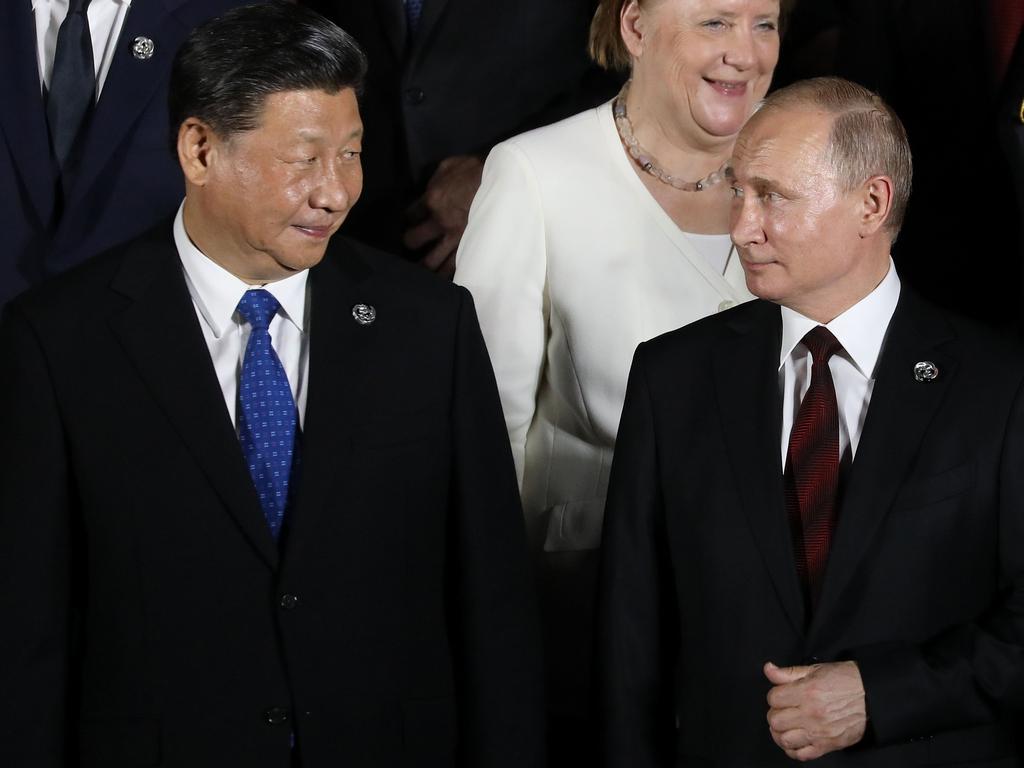 Mr Xi and Mr Putin’s alliance has been strengthening in recent years. Picture: Dominique JACOVIDES / POOL / AFP