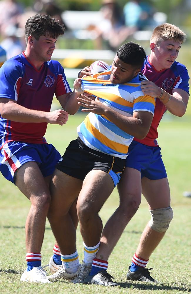 Boys Rugby League State Championship held at Northern Division, Brothers Leagues ground, Townsville. 16-18 years. Peninsula (stripe) v Darling Downs (blue/purple). Jason Hastie of Mareeba SHS