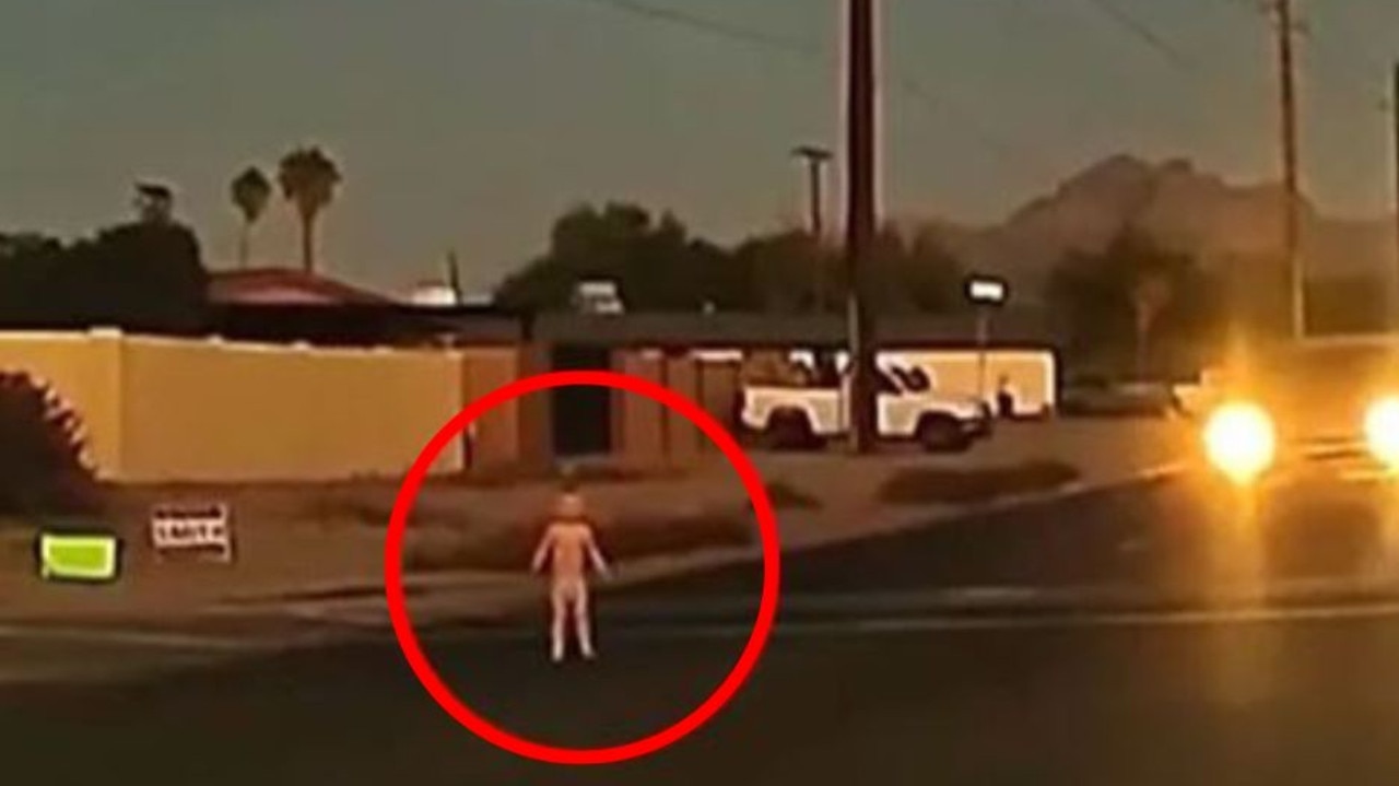 Toddler wanders into busy intersection