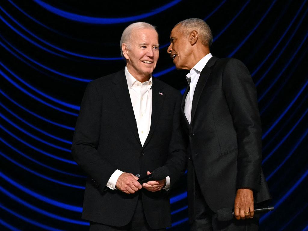 US President Joe Biden with former US president Barack Obama onstage during a campaign fundraiser at the Peacock Theatre in Los Angeles. Picture: AFP