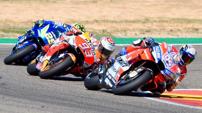 Iannone briefly led as Dovizioso and Marquez’s duelling slowed them.