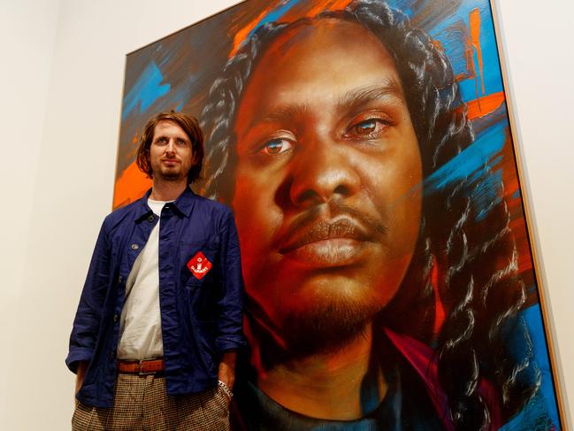 Matt Adnate was awarded the Archibald Packing Room Prize for his portrait of Baker Boy at The Art Gallery of NSW on Thursday. Picture: NCA NewsWire / Nikki Short