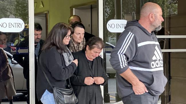 Francesca Macheda, centre, wife of Giuseppe ‘Joe’ Macheda, leaves the District Court with supporters after hearing sentencing submissions for Ryan. Picture: Eva Blandis