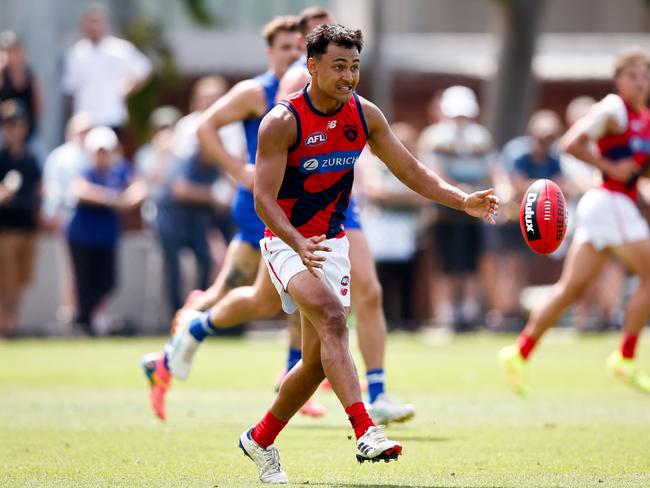 MELBOURNE, AUSTRALIA - FEBRUARY 22: Andy Moniz-Wakefield of the Demons kicks the ball during the 2025 AFL match simulation between the North Melbourne Kangaroos and Melbourne Demons at Arden Street on February 22, 2025 in Melbourne, Australia. (Photo by Dylan Burns/AFL Photos via Getty Images)