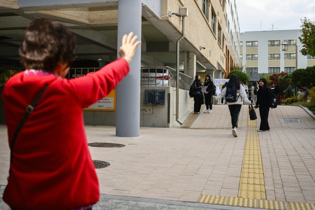 Live-streamed prayers for stressed S. Korean exam parents