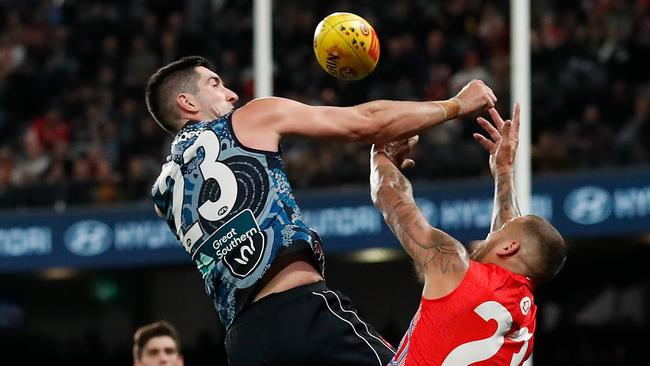 Jacob Weitering spoils a marking attempt by Lance Franklin. Picture: Michael Willson/AFL Photos via Getty Images