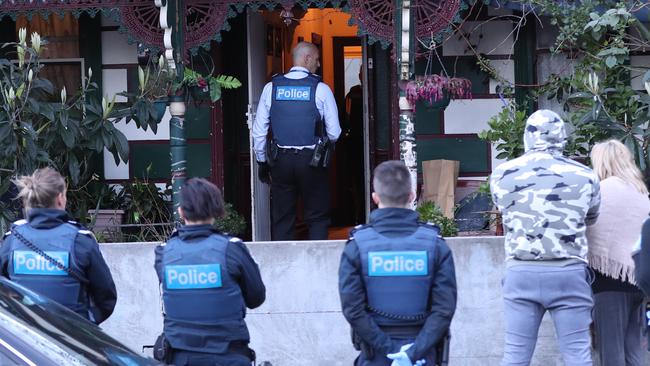 Officers have swarmed the Hope St property. Picture: David Crosling