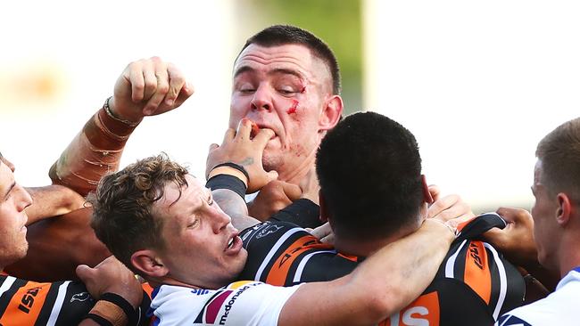 The Knights thumped the Tigers 42-24 in a fiery round-two encounter. They resume hostilities in Newcastle in round 13. Picture: Cameron Spencer/Getty Images