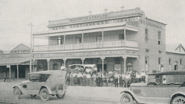 W.E. Curtis, Auctioneers, Bundaberg, 1927. Founded by William Edward Curtis, this prominent firm specialised in land sales and fruit and produce auctions. Its Quay Street premises succumbed to a blaze circa 1964. Source: The Burnett and Isis Pictorial via Centre for the Government of Queensland