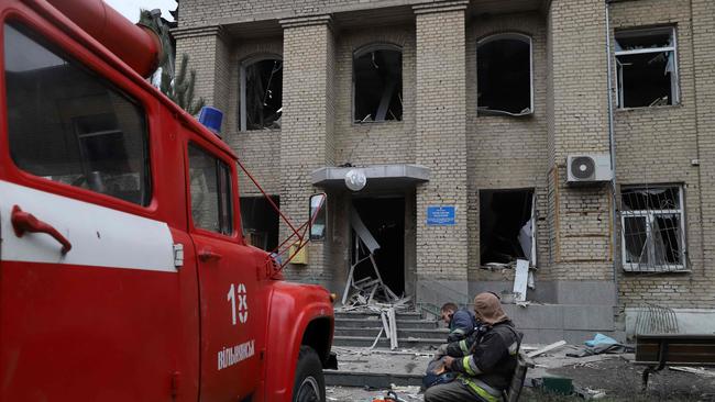 A woman with a newborn baby as well as a doctor were inside the building at the time of the strike. Picture: AFP.