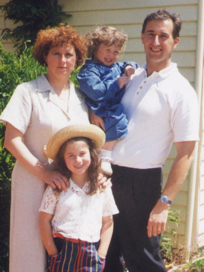 Walter Mikac and his family in front of Walter’s Tasman Pharmacy at Nubeena. Picture: Supplied