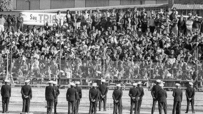 Police line up in front of the crowd at the Australia v South Africa Test in Brisbane in 1971.