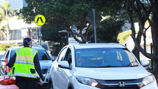 Queensland Police manning the Queensland-NSW border on Saturday. Picture: Mike Batterham