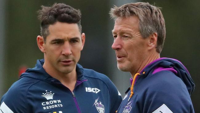 MELBOURNE, AUSTRALIA - MAY 16:  Billy Slater of the Melbourne Storm and Storm coach Craig Bellamy talk during a Melbourne Storm NRL media session at Gosch's Paddock on May 16, 2018 in Melbourne, Australia.  (Photo by Scott Barbour/Getty Images)
