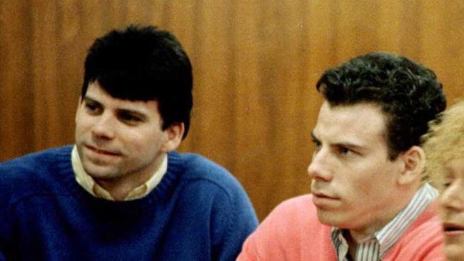 (FILES) This 1992 file photo shows double murder defendants Erik (R) and Lyle Menendez (L) during a court appearance in Los Angeles, Ca.  The Menendez brothers have been found guilty of first degree murder 20 March in their second trial for the killing of their parents.  AFP PHOTO    Mike NELSON/mn (Photo by MIKE NELSON / AFP)